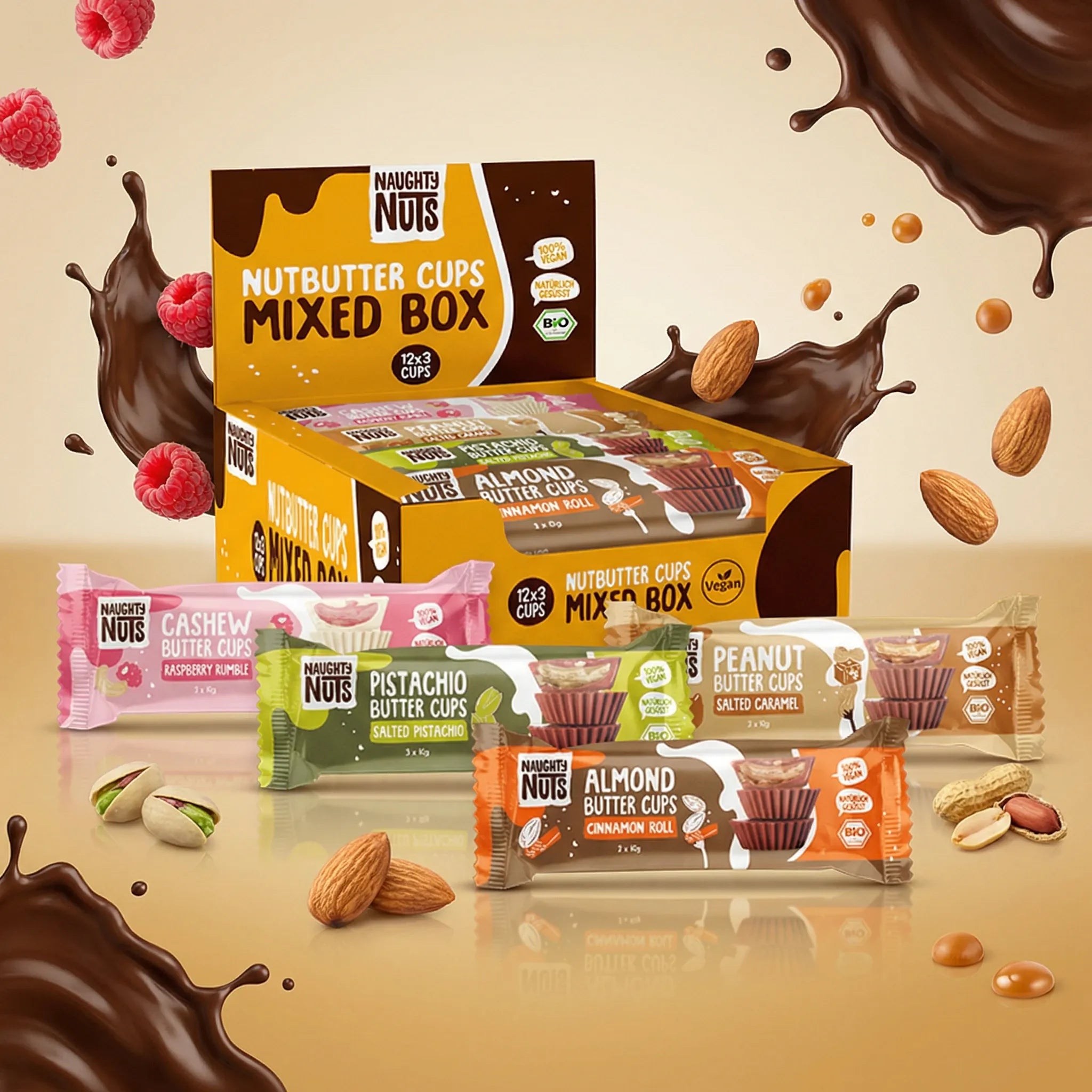 Bio Nutbutter Cups Mixed Box mit Schokoladenspritzern, Himbeeren, Mandeln, Pistazien und Erdnüssen